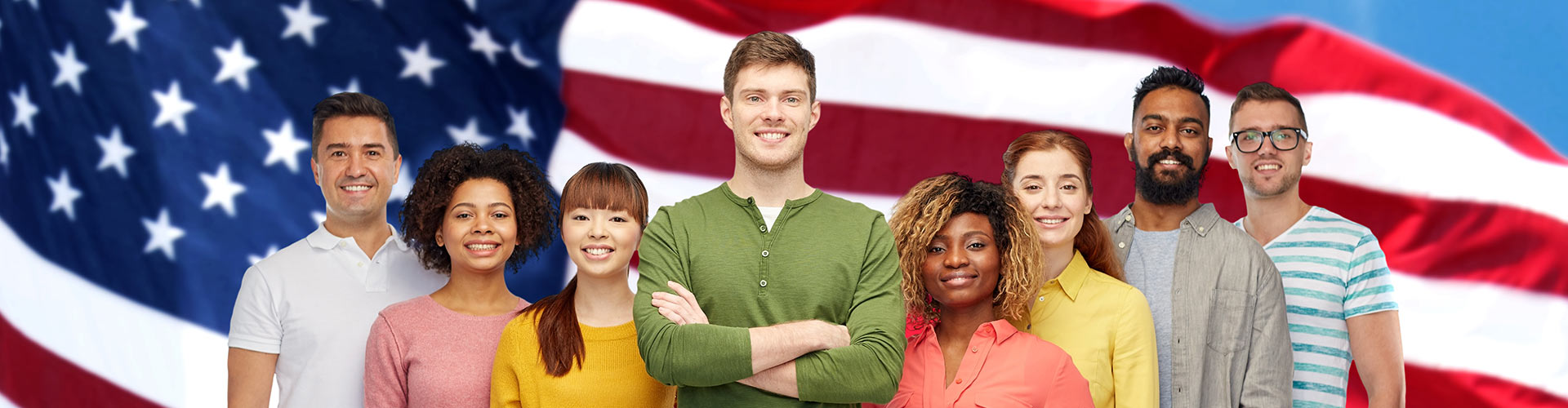 people of different ethnicity in front of the American flag